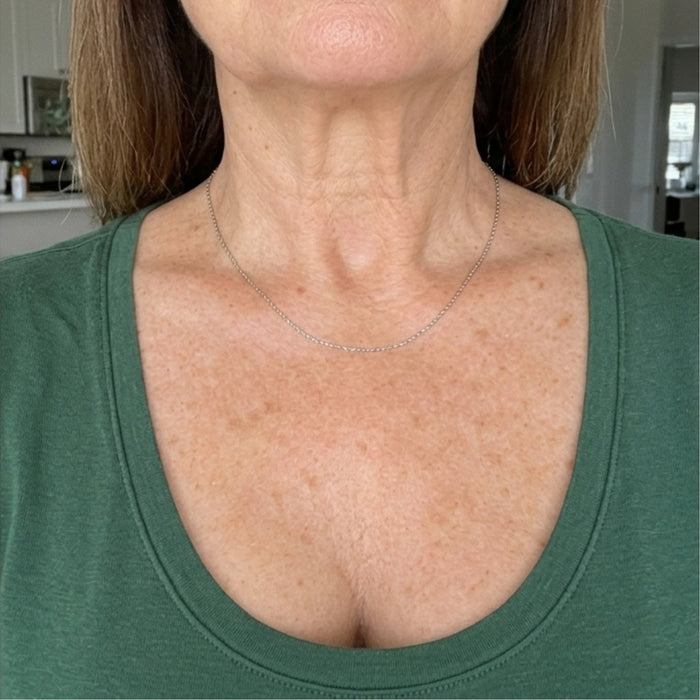 Neck and chest after using the body oil